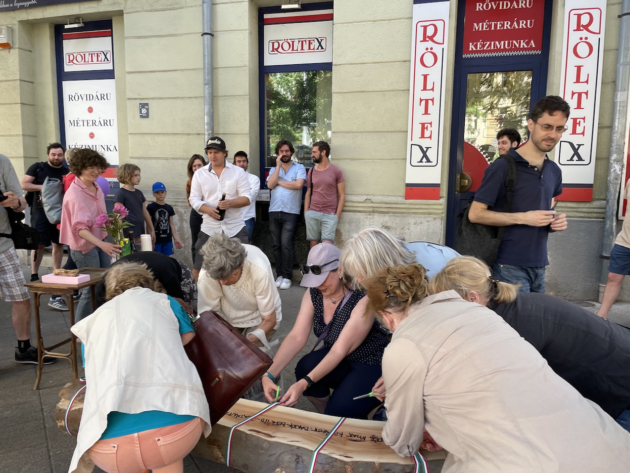 Inauguration oInauguration of a bench made from a local plane tree. Photo by Levente Polyakf a bench made from a local plane tree. Photo by Levente Polyak