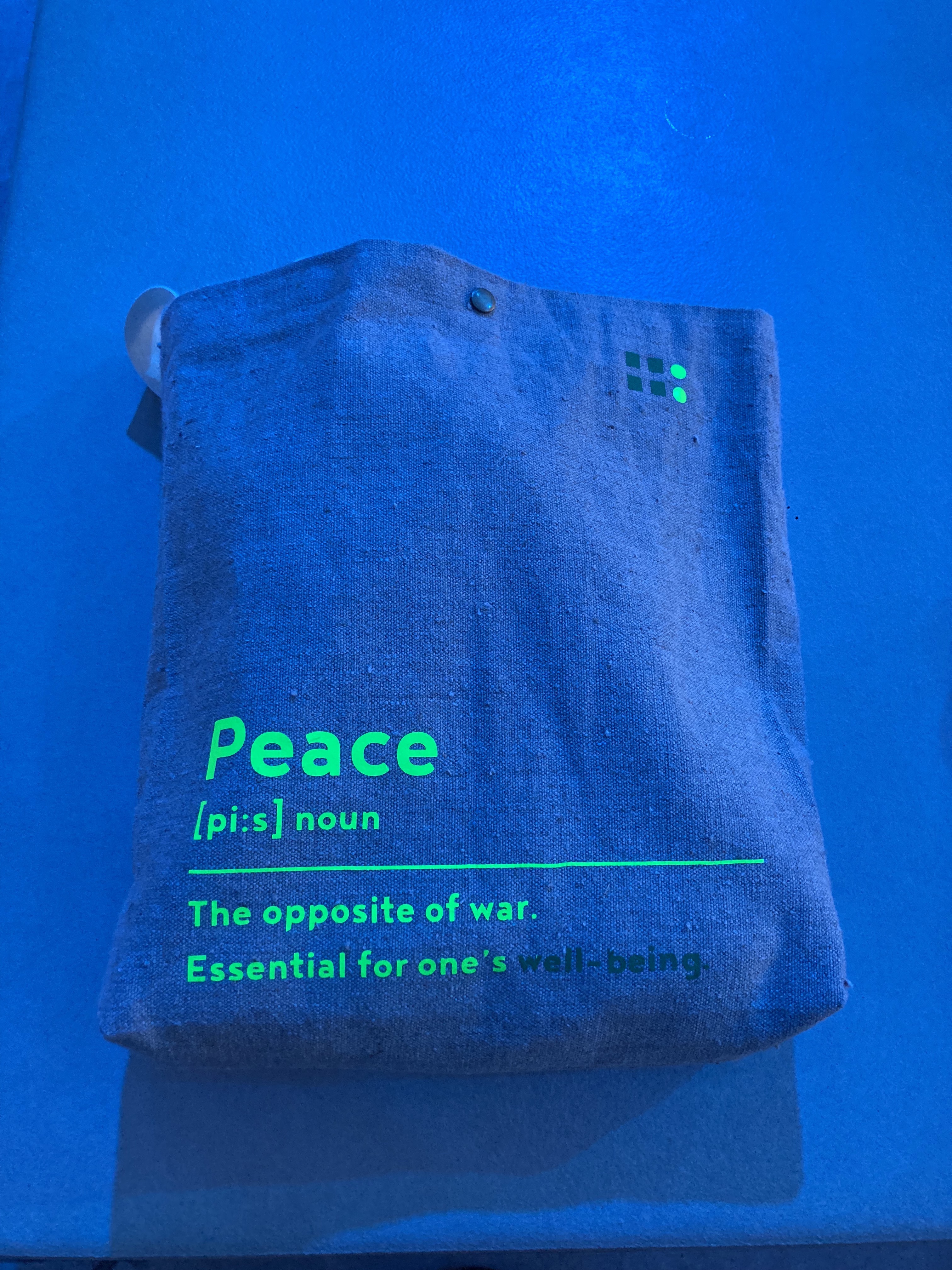 A tote bag developed by the team of Kosice 2.0 states that peace is a key element for peoples' well-being.