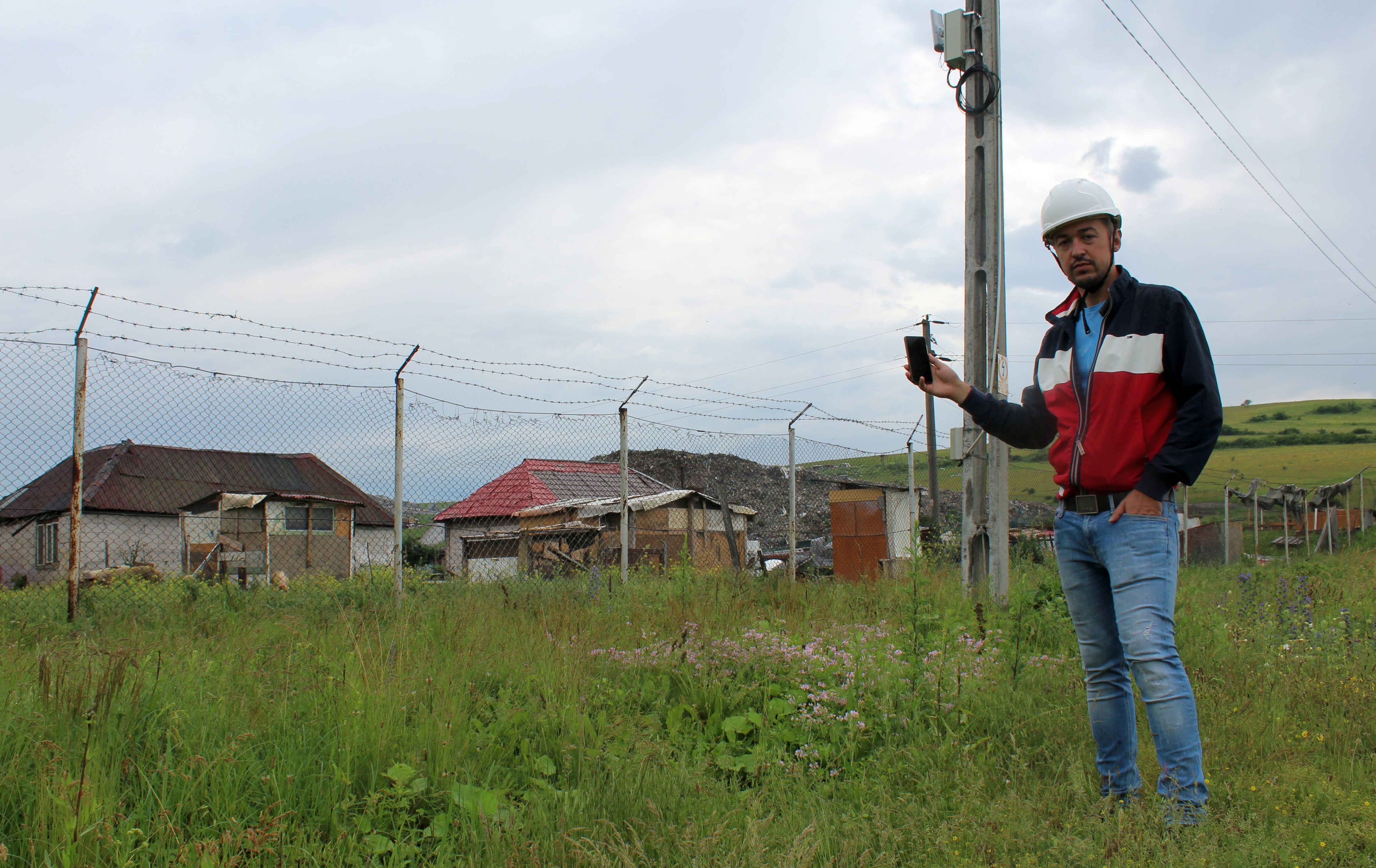 Image 6: An engineer is testing the wi-fi connection just installed in Pata Rât. Source: ADI-ZMC