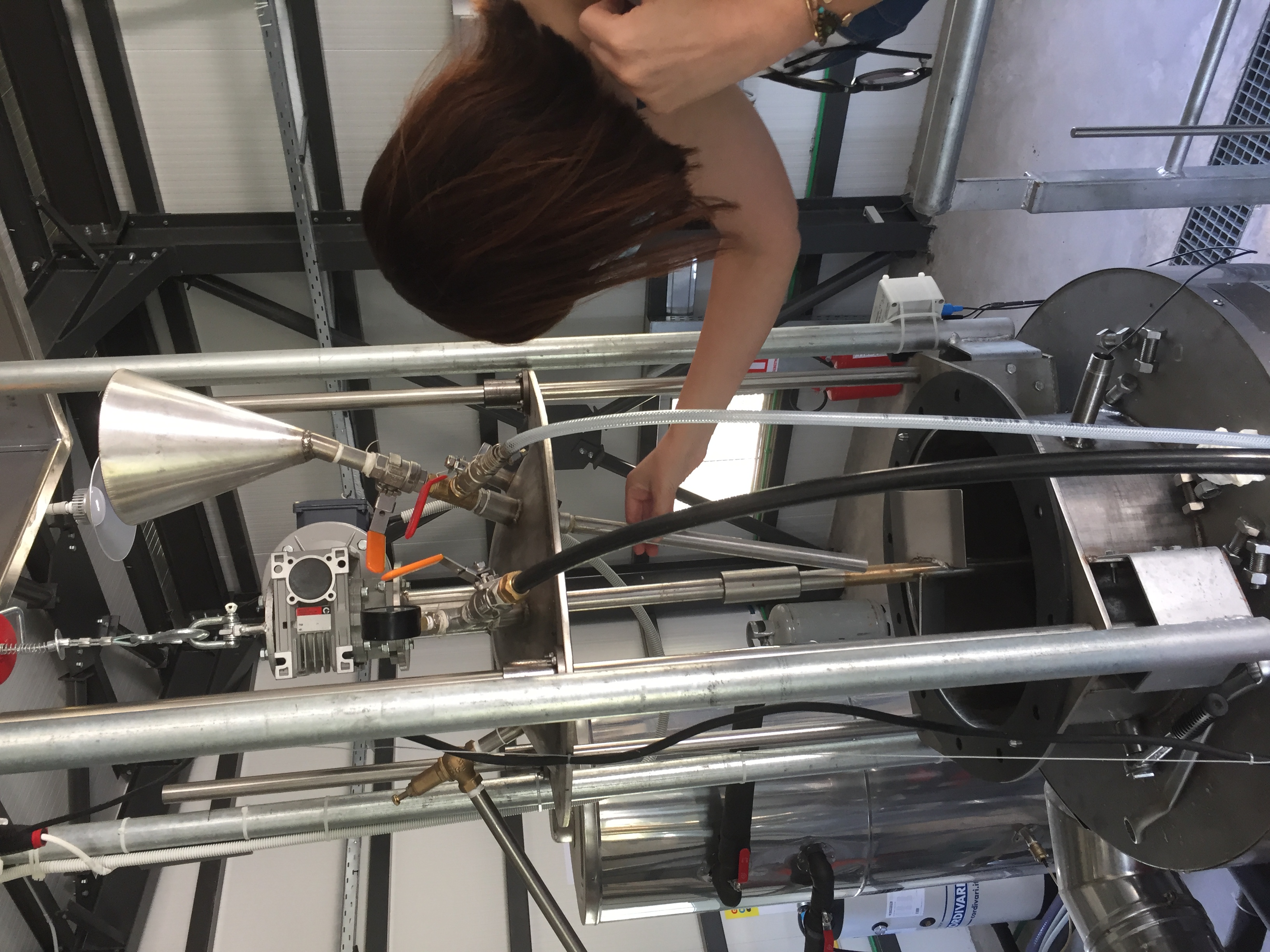 Picture 8: A member of the team checking reactor 1