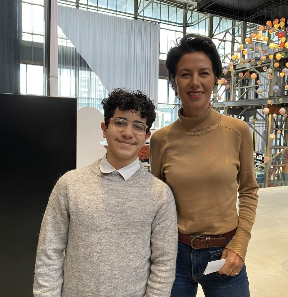 Eyas Sawas (T-reporter) with visiting state secretary Gunay Uslu