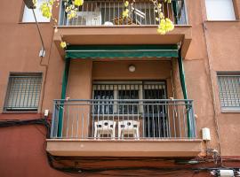 Balcony of a renovated flat with two white chais